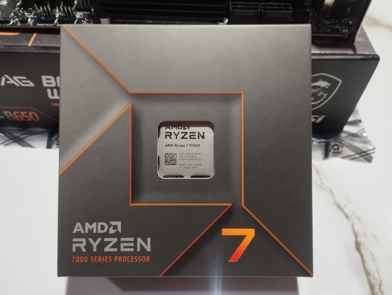 AMD Ryzen 7 7700X 8-Core, 16-Thread Unlocked Desktop Processor customer photo 1