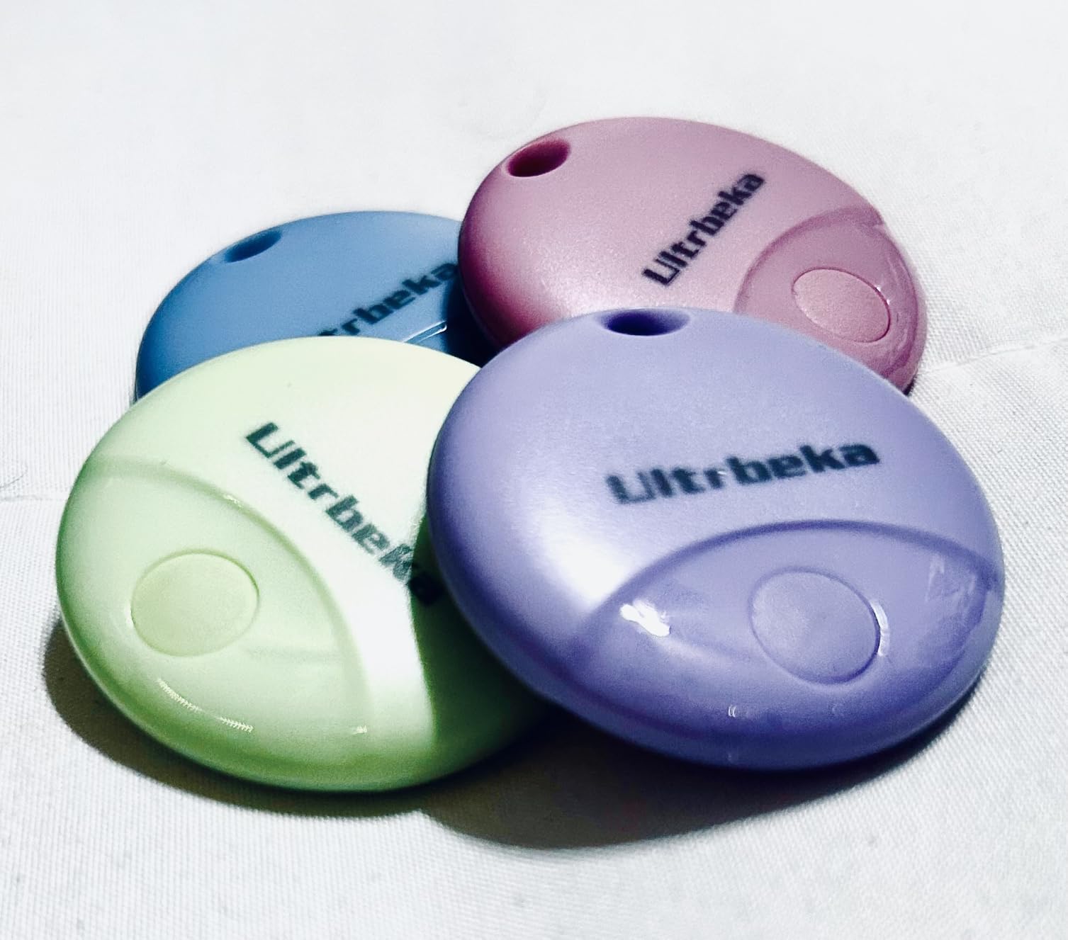 Ultrbeka Air Tracker Tag 4 Pack Bluetooth Item Finder for iPhone - MFi Certified Smart Tracker Compatible with Apple Find My, IP67 Waterproof Key Finder for Keys, Wallet, Luggage, Bike, Backpack customer photo 2