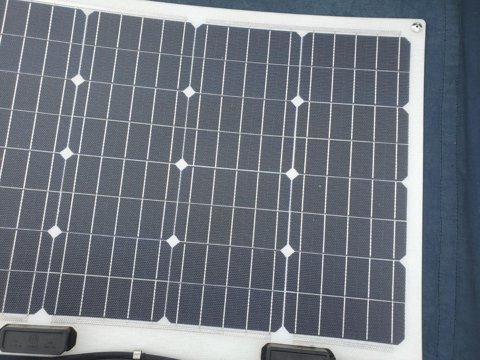 Renogy Flexible Solar Panel 50 Watt, 240° Ultra Flex Bendable | 50W Flexible Solar Panel for Marine RV Cabin Van Car Boat Curve Surfaces Off-Grid Systems, 0.1 Inch Lightweight, IP68 customer photo 1