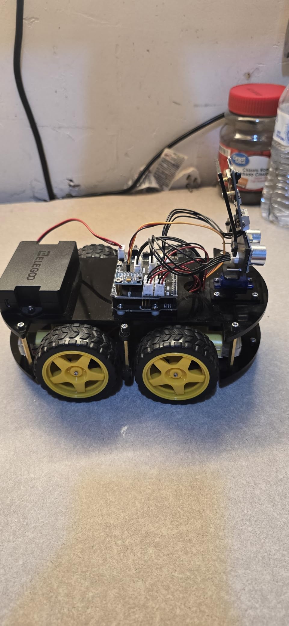 ELEGOO UNO R3 Smart Robot Car Kit V4 with Camera, Compatible with Arduino | FPV Video, Line Tracking, Obstacle Avoidance, Auto Follow, App & IR Control, Class STEM Building & Coding Kit, Gift for 12+ customer photo 1