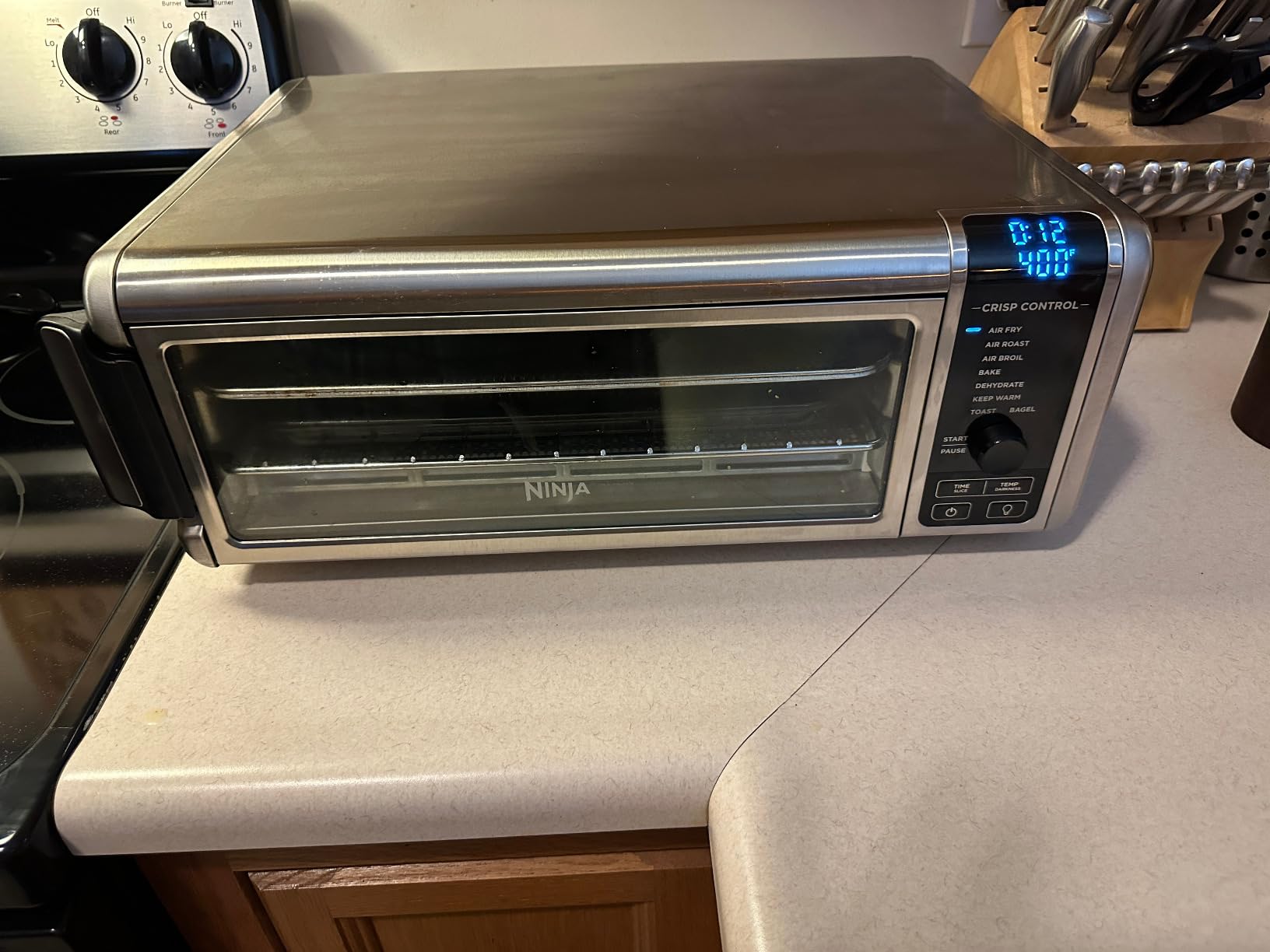 Ninja Digital Air Fry Countertop Oven, 8-in-1, XL, Silver, SP101 | Air fry, air roast, broil, bake, toast, bagel, dehydrate, keep warm, 1800W, Flip up & away customer photo 2