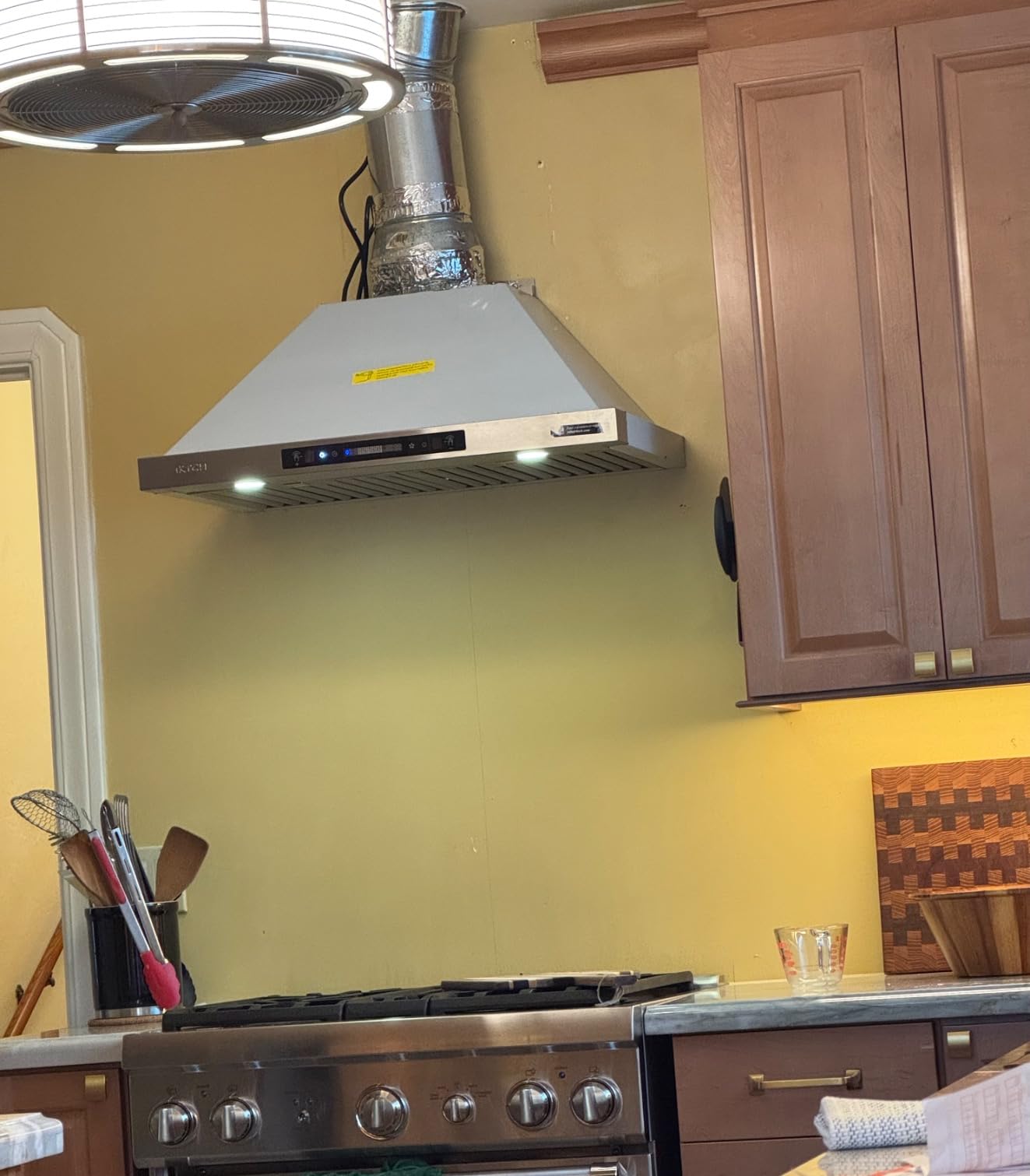 IKTCH 36-inch Wall Mount Range Hood 900 CFM Ducted/Ductless Convertible, Kitchen Chimney Vent Stainless Steel with Gesture Sensing & Touch Control Switch Panel, 2 Pcs Adjustable Lights (IKP02-36) customer photo 1