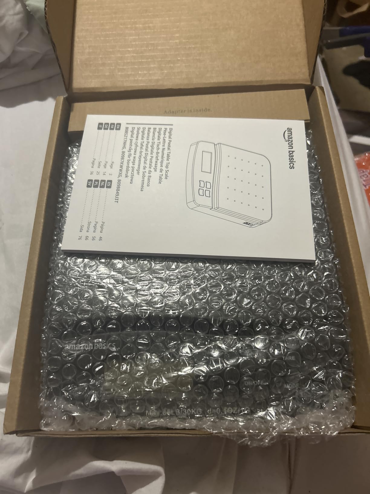 Amazon Basics Digital Postal Shipping Scale with Tare Function, AC Adapter, 65 lb Capacity, 0.1 oz Readability, LCD Display, Black customer photo 1