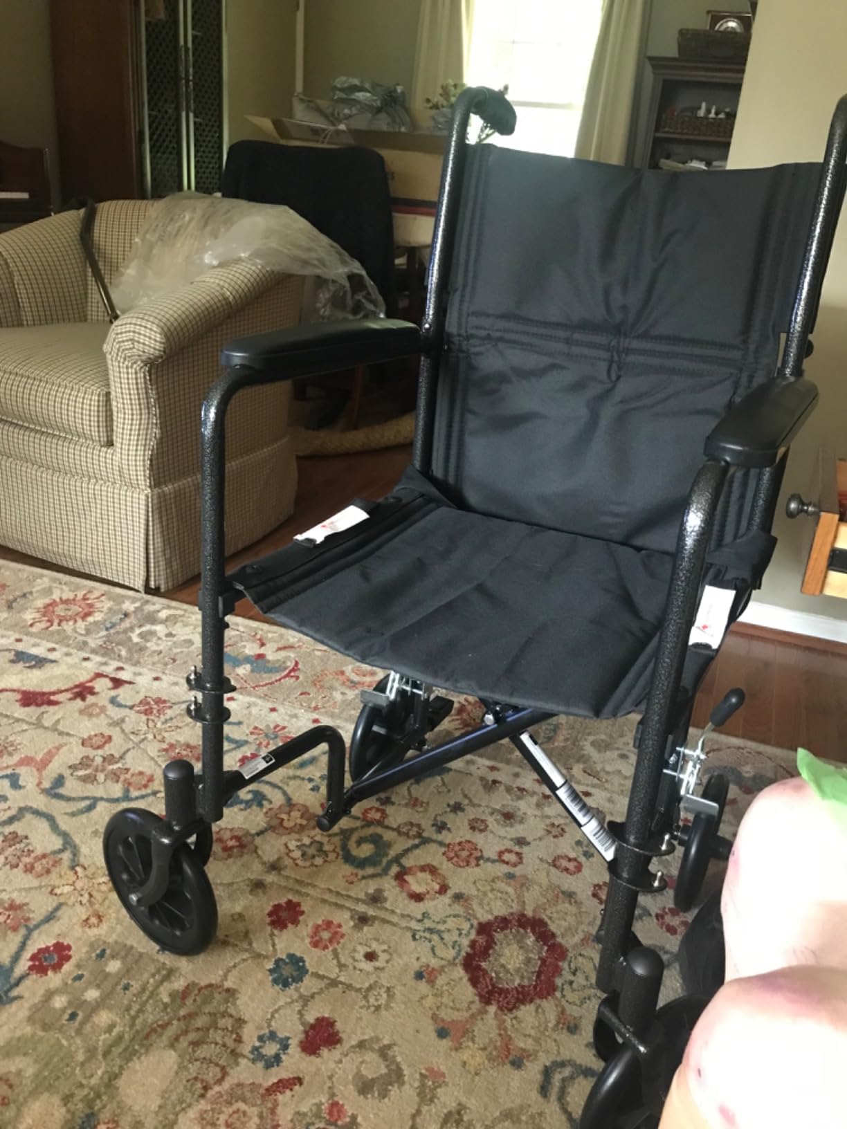 Medline Durable Folding Steel Transport Wheelchair with Swing-Away Footrests, 19-Inch Seat Width, Black Frame, Black Upholstery customer photo 1