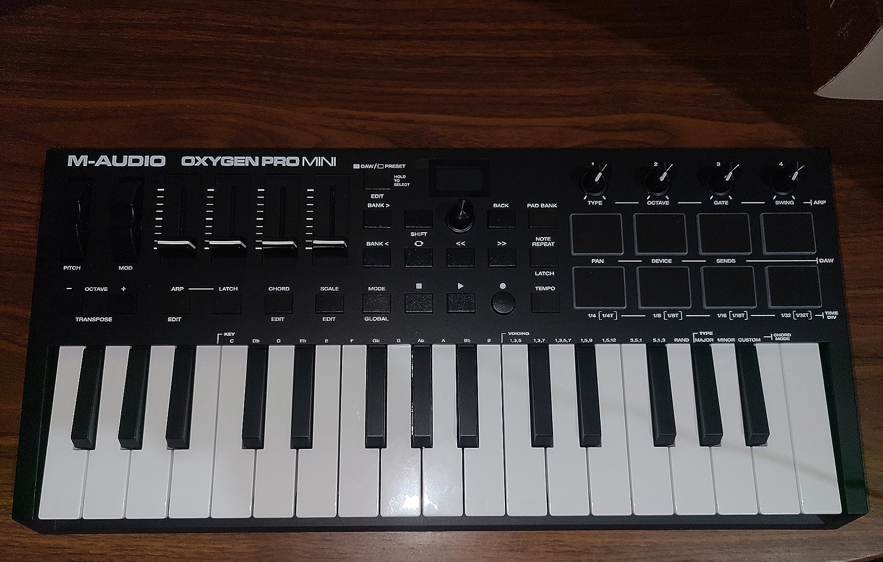 M-AUDIO Oxygen Pro Mini 32 USB MIDI Keyboard Controller | 32 Velocity-Sensitive Mini-Keys, 8 Beat Pads, 4 Knobs, 4 Faders, and Bundled DAW Recording Software, for Music Production customer photo 1