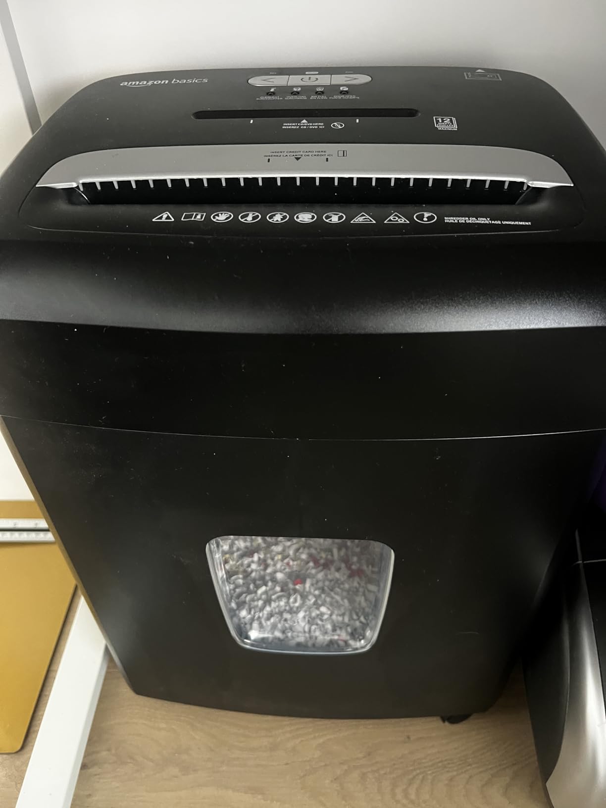 Amazon Basics 12 Sheet High Security Micro Cut Paper, Credit Card and CD Shredder with 6 Gallon Easy Emptying Bin, Casters, Black customer photo 1