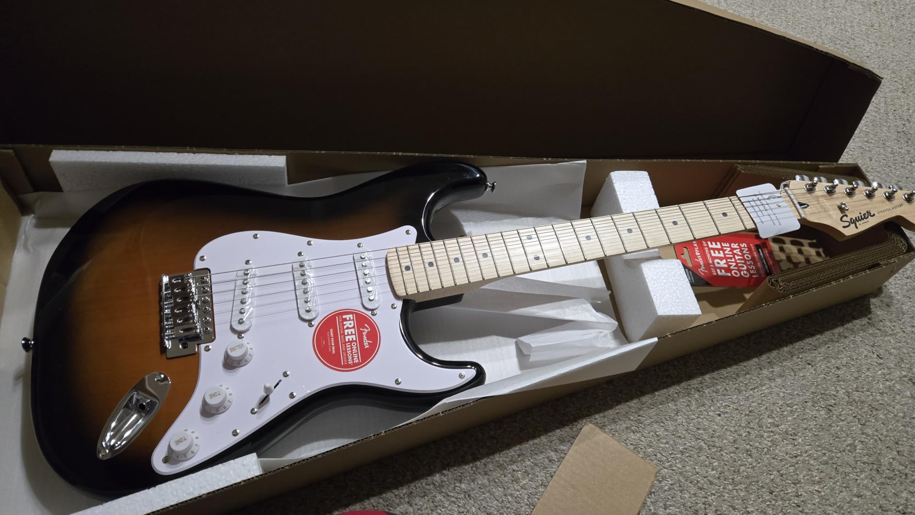 Squier Sonic Stratocaster Electric Guitar Pack, Includes Guitar Amp, Black | Complete starter kit, 10G amp, gig bag, cable, strap, picks included, maple fingerboard, adults and teens customer photo 1