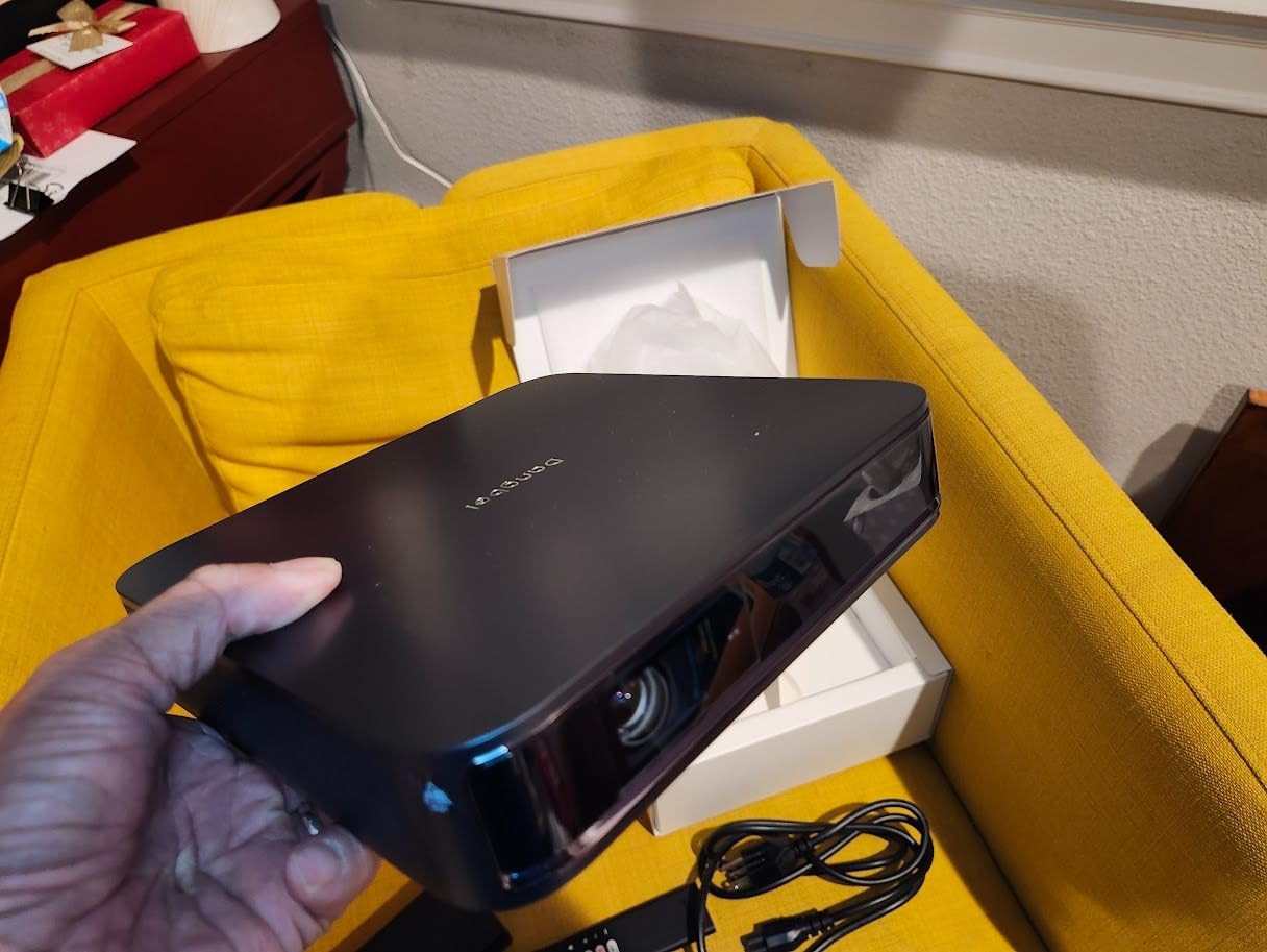 Dangbei Atom Portable Laser Projector, Google TV with Official Netflix, 1200 ISO Lumens, 180