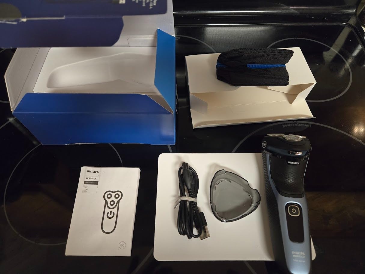 Philips Norelco 3600 Electric Shaver, Storm Blue | 27 Self Sharpening ComfortCut Blades, 5D Pivot & Flex Heads, Wet or Dry Use, Includes Travel Pouch, S3243/91 customer photo 2