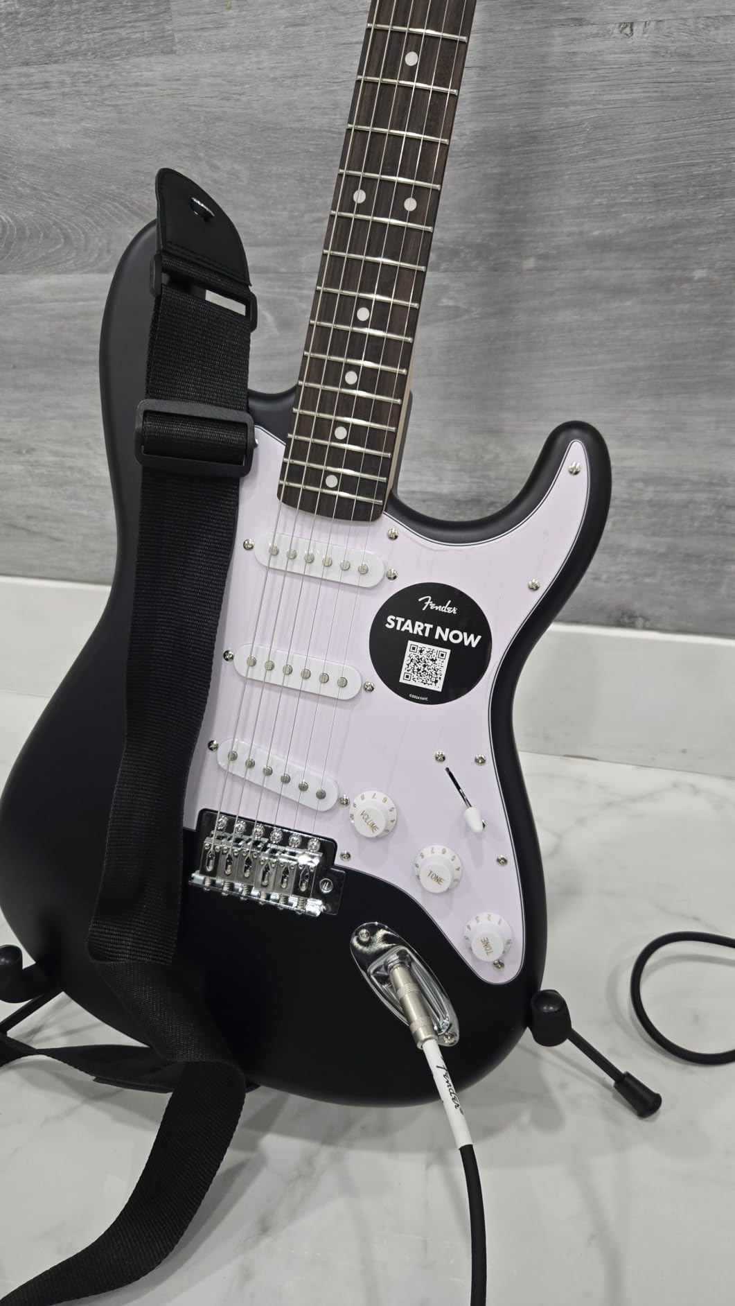 Fender Squier Debut Stratocaster Beginner Electric Guitar Kit, Matte Black | Complete starter pack with Frontman 10G amp, padded gig bag, strap, free lessons, 2-year warranty included customer photo 1