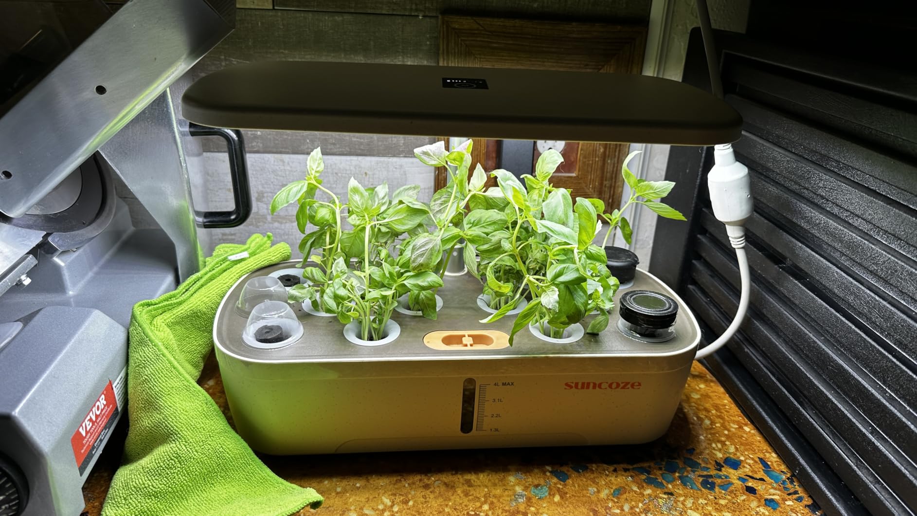 SUNCOZE Hydroponics Growing System, 12 Pods, 12.4 in Adjustable Height | Indoor herb Garden with 20W LED Grow Light, Visible Water Tank with Pump, Indoor Gardening System, Gardening Gifts, Black customer photo 1