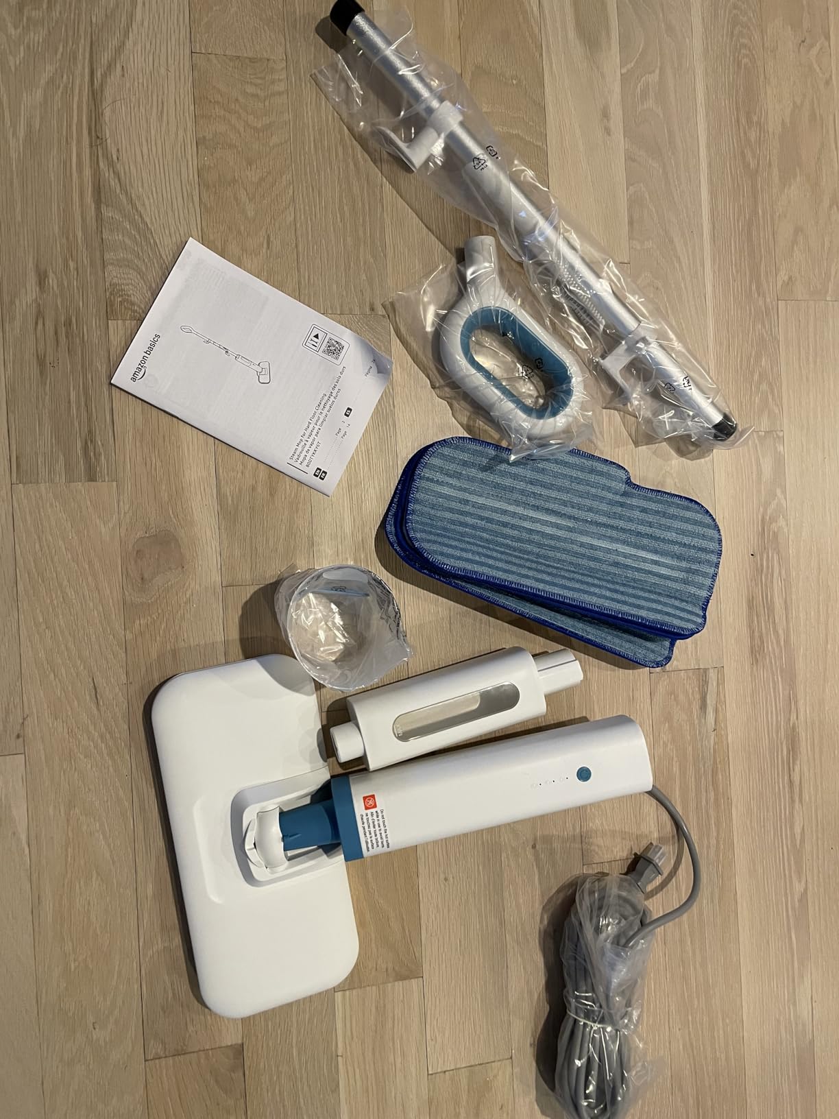 Amazon Basics Steam Mop for All Sealed Hard Floors, Heats Up in 30 Seconds, Chemical-Free Cleaning, 3 Washable Pads, 20-Foot Cord, White customer photo 1