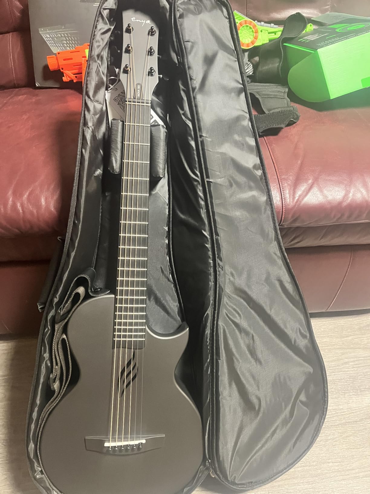 Enya NOVA GO Carbon Fiber 35-Inch Acoustic Travel Guitar, Black | Lightweight 3.7 lbs Design, Moisture-Resistant Body, Easy to Carry for Adults and Beginners, Gig Bag and Accessories Included customer photo 1