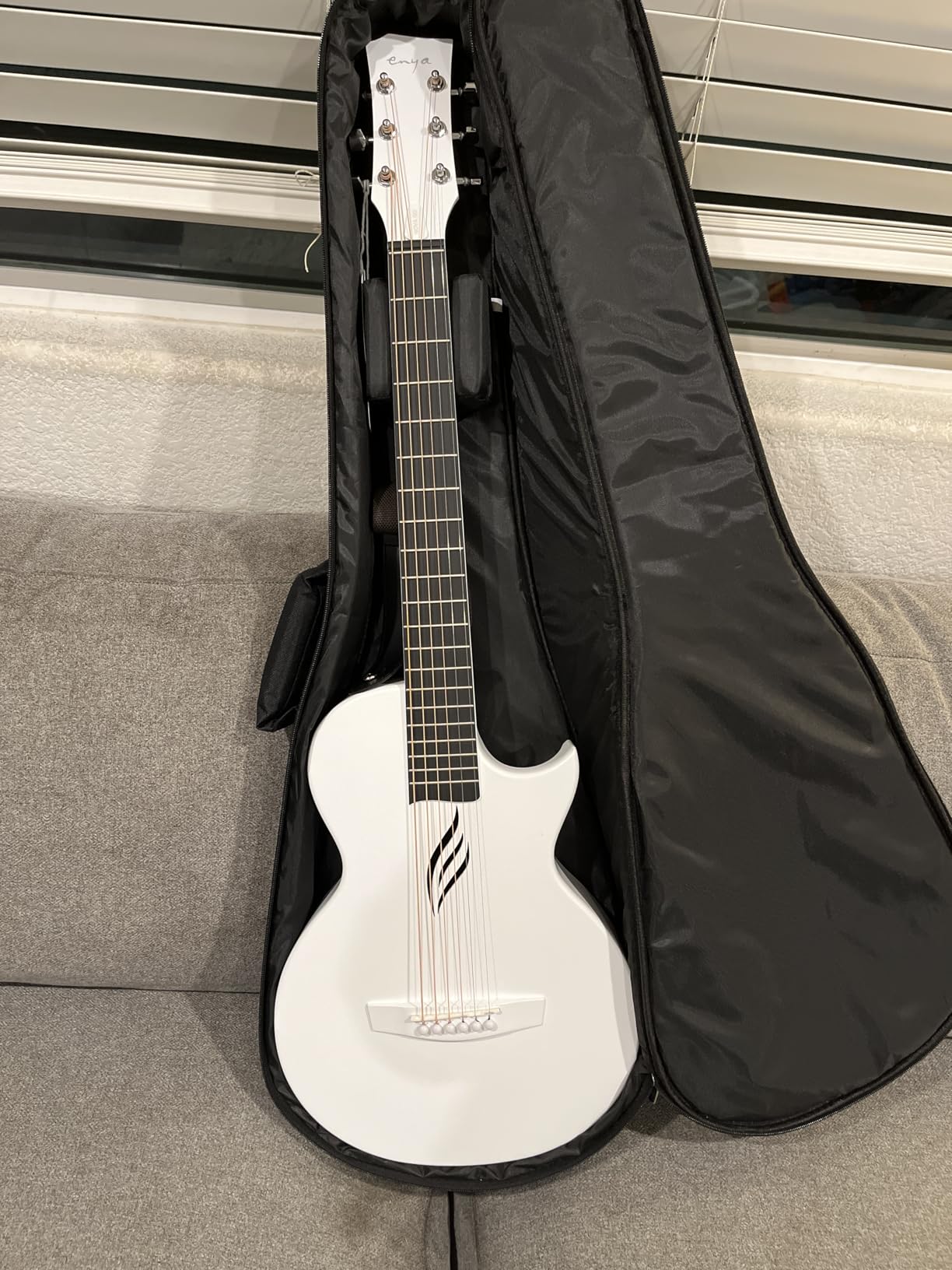Enya NOVA GO Carbon Fiber 35-Inch Acoustic Travel Guitar, Black | Lightweight 3.7 lbs Design, Moisture-Resistant Body, Easy to Carry for Adults and Beginners, Gig Bag and Accessories Included customer photo 2