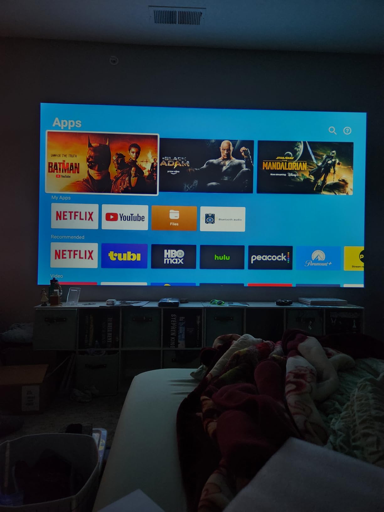 [Official Apps & Live TV & 330° Stand] Smart Mini Projector with WiFi and Bluetooth Ultra-thin, 4K Support Outdoor Movie Projector, Auto Focus, HDR10, Portable 1080P Projector for Bedroom/Home/Celling customer photo 2