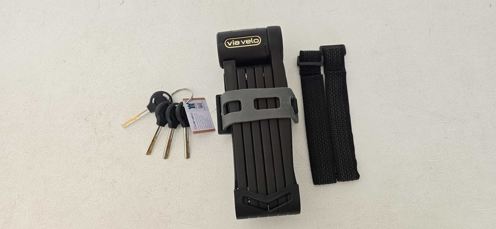 Via Velo Folding Lock with Hardened Steel and Sold Secure Gold. Extends 90cm, Includes Bracket and 4 Keys. AirTag Slot Lets You Track Your Bike. Easy to Carry and Compact for e-Bikes and Scooters. customer photo 1
