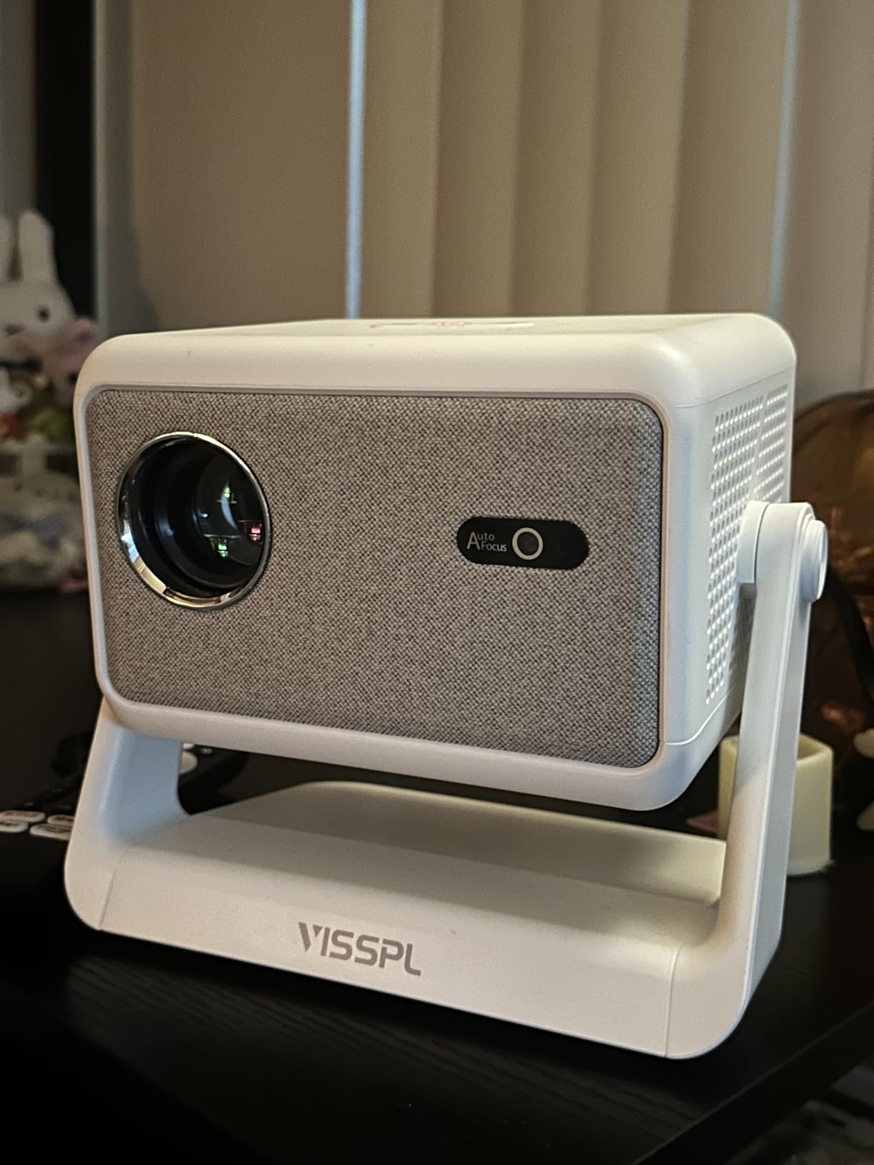 Mini Projector, VISSPL Full HD 1080P Video Projector, Portable Outdoor Projector with Tripod, Kids Gift, Home Theater Movie Phone Projector Compatible with Android/iOS/Windows customer photo 1