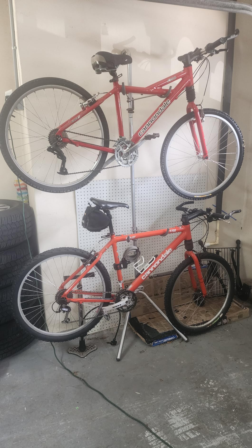 Delta Cycle Two Bike Gravity Pole Stand Garage, 2 Bike Storage Rack, No Drilling Required, Fully Adjustable Vertical Bike Rack for Any Style Bicycle, Leaning Wall Bike Rack Holds Up to 60 lbs customer photo 1