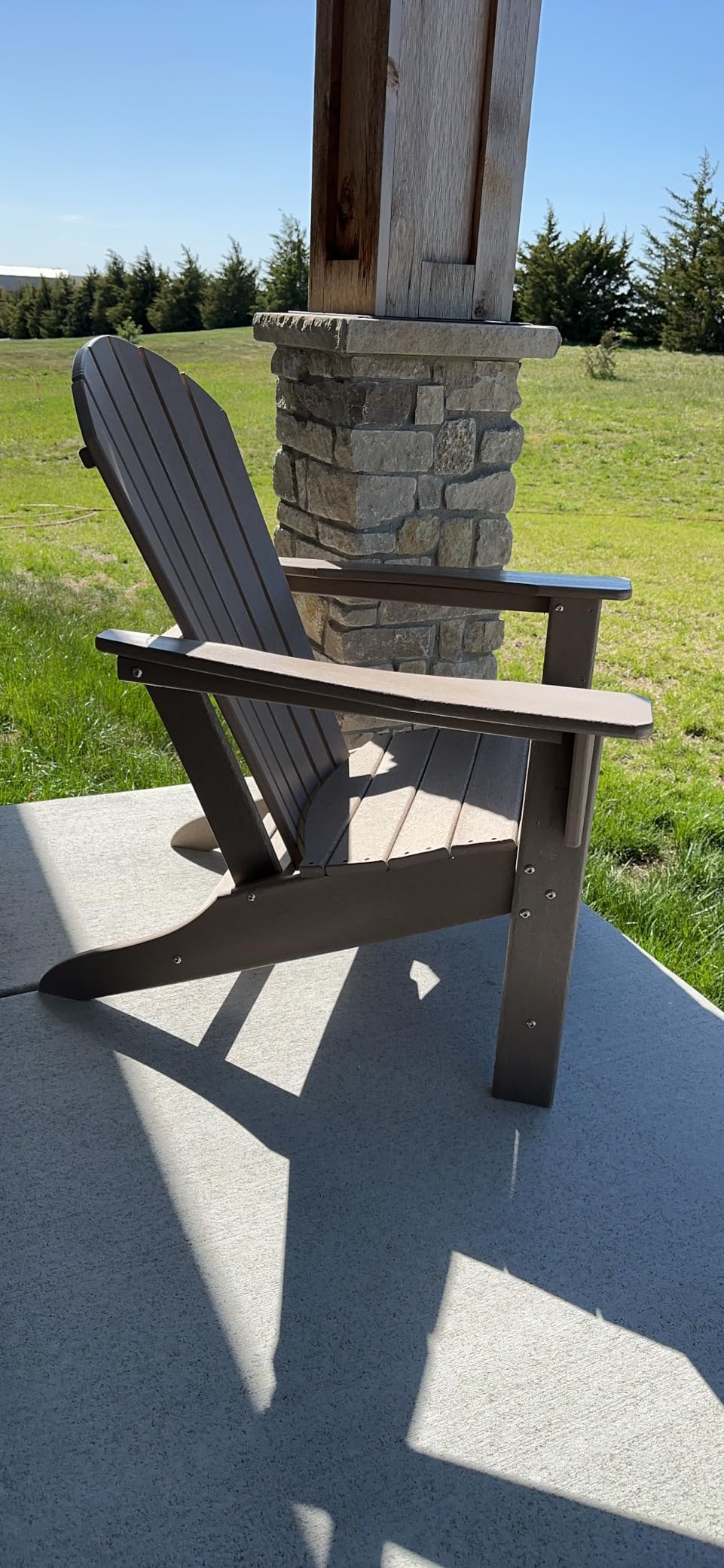 Signature Design by Ashley 1-Piece HDPE Outdoor Adirondack Chair, Driftwood | Durable weather resistant HDPE, 36-pound stationary frame, Comfortable 16.25-inch elevated seat, Sundown Treasure Series customer photo 1
