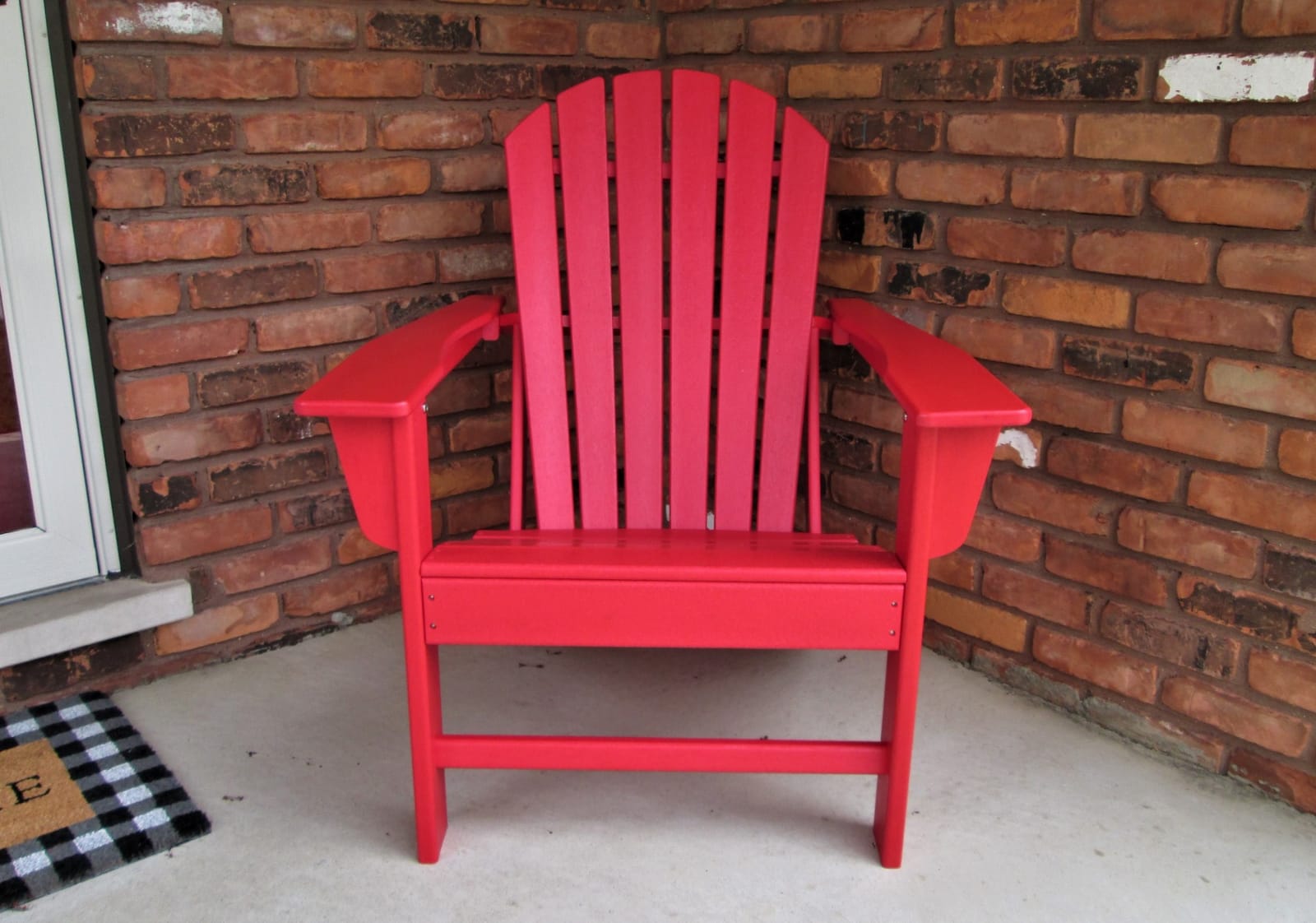 Signature Design by Ashley 1-Piece HDPE Outdoor Adirondack Chair, Driftwood | Durable weather resistant HDPE, 36-pound stationary frame, Comfortable 16.25-inch elevated seat, Sundown Treasure Series customer photo 2