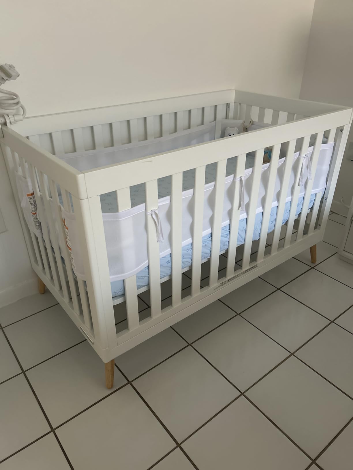 Delta Children Essex 4-in-1 Convertible Baby Crib, Bianca White with Natural Legs customer photo 2