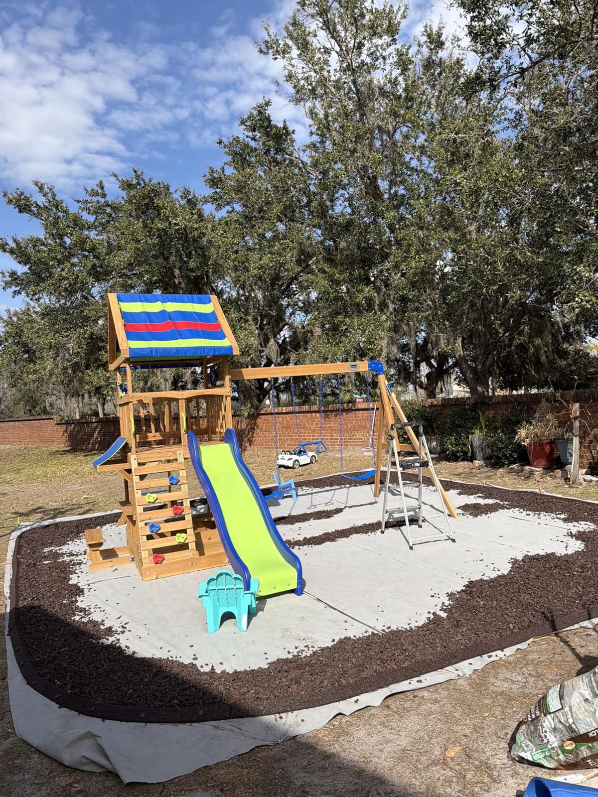 Backyard Discovery Belmont Cedar Wood Swing Set with Wave Slide, Play Deck, Rock Wall Ladder, Snack Bar Window, Shaded Picnic Area, Bench, Belt Swings, Trapeze, Sandbox Area, Canopy, Outdoor Playset customer photo 1