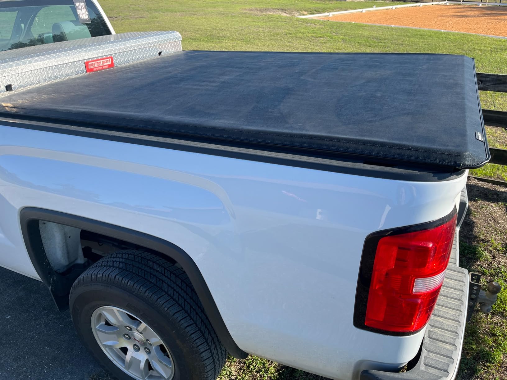 Amazon Basics Soft Roll-Up Truck Bed Tonneau Cover, 6.5 ft, Water-Resistant, Works with Bed Liners for 2014-2019 Chevy Silverado, GMC Sierra 1500, 2015-2018 Silverado Sierra 2500 3500 HD, Fleetside customer photo 2