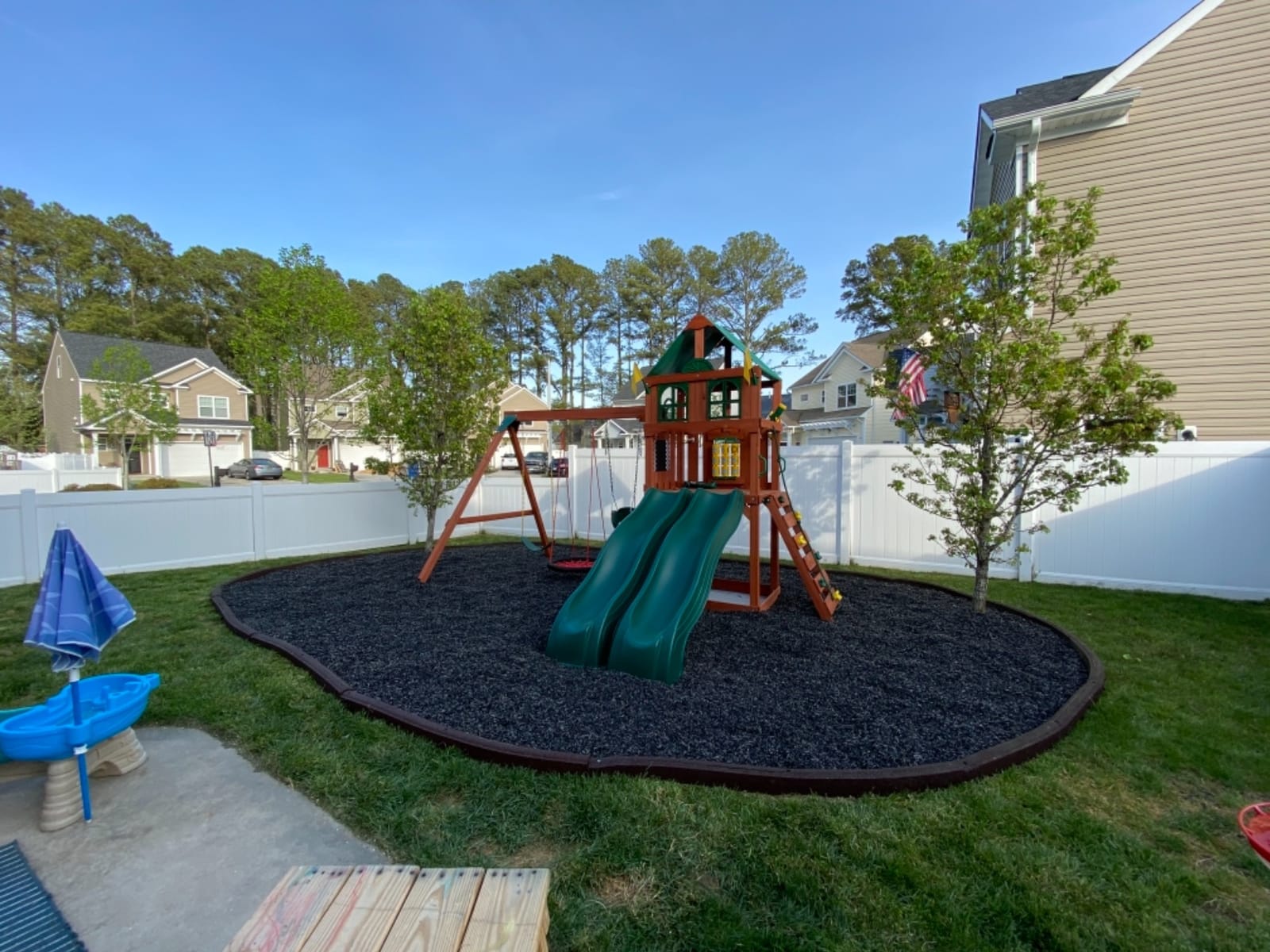 Gorilla Playsets Playmaker Deluxe Wooden Swing Set with Vinyl Canopy Roof, Dual Wave Slides, and Rock Climbing Wall, Redwood Stained Cedar customer photo 2