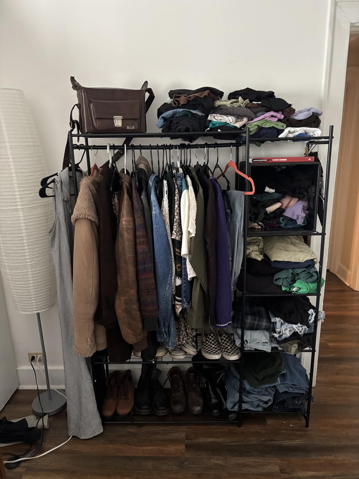 HOMIDEC Wardrobe Closet,Portable Clothes Rack with 4 Tiers Shelves | Freestanding Closet Organizers and Storage System with Hanging Rod,Steel Clothing Rack Suitable for Cloakrooms,Bedrooms.Black customer photo 1