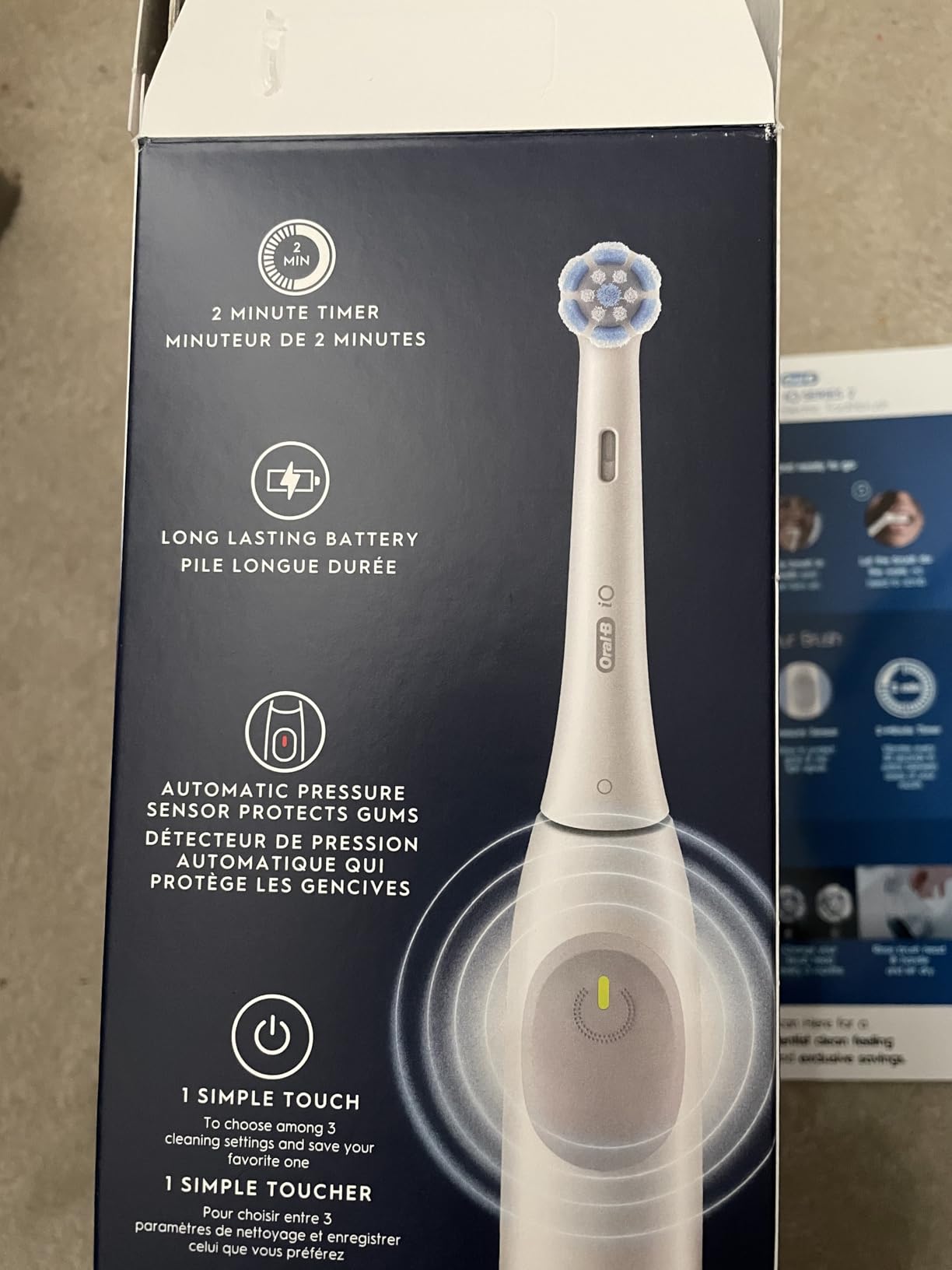 Oral-B Rechargeable Electric Toothbrush, iO Limited Simple Clean, 3 Cleaning Modes, Automatic Pressure Sensor to Protect Gums, Travel Case, White customer photo 1