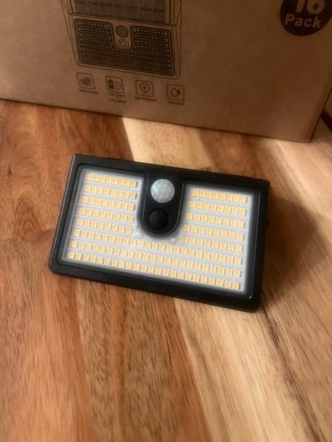 [6 Packs] Solar Motion Sensor Outdoor Lights, Super Bright Solar Lights Outdoor Waterproof, 3 Lighting Modes Security Wall Light for Outside Walking Dog Fence Backyard Deck Garden Door Step Garage customer photo 1