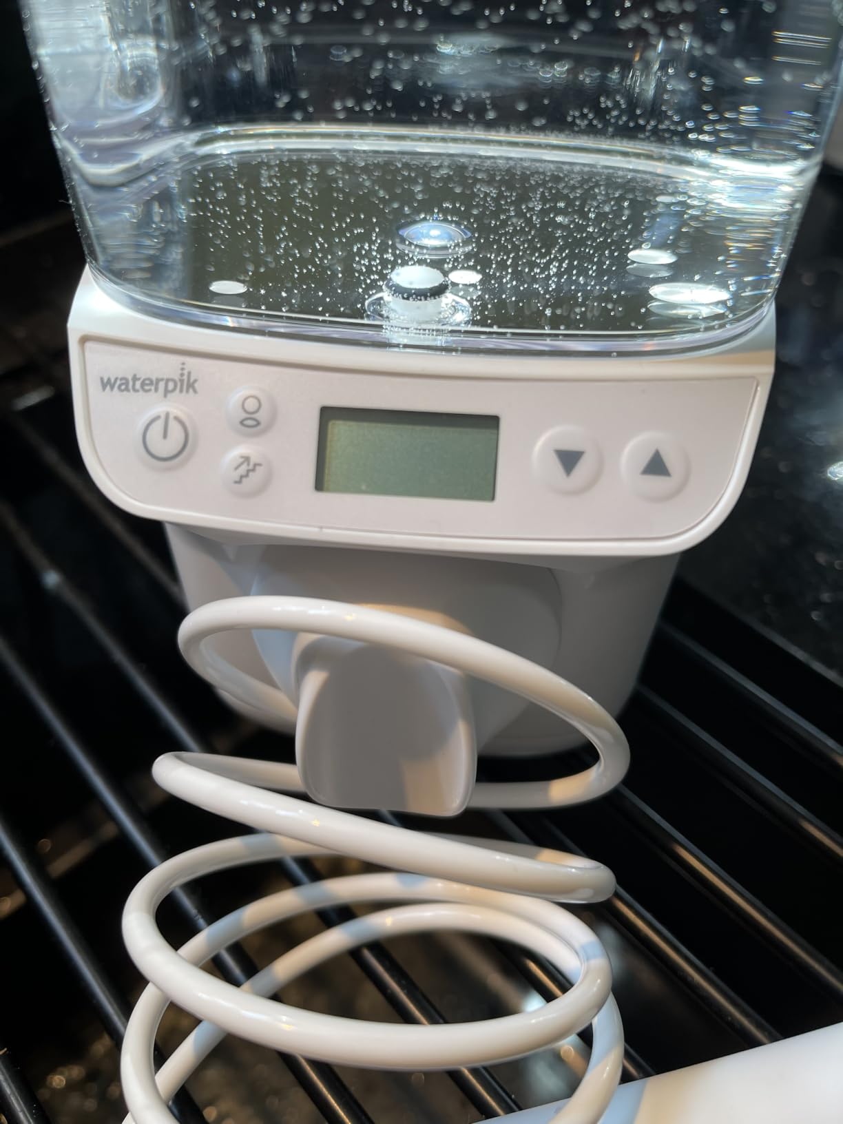 Waterpik Promax Countertop Water Flosser, SmartAdvance, 10 Settings, 5 Tips customer photo 2